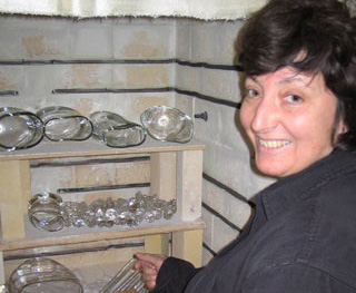 Liz in front of the kiln